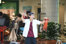 Musical Theater: Music at the Sidewalk Snack Booth (Da Pai Dang)