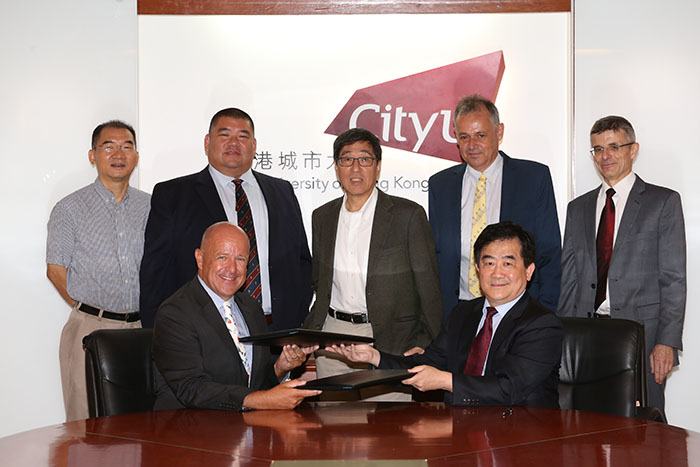 Front row from Left: Mr. Peter Johnston, Quality & Food Safety Director, Greater China, PARKnSHOP (HK) Ltd; Professor Alex Jen Kwan-yue, Provost Back row from Left: Professor Michael Yang, Head of Department of Biomedical Sciences; Dr Howard Wong, Director, Professional Development and Communications; Professor Way Kuo, University President; Professor Michael Reichel, Dean of College of Veterinary Medicine and Life Sciences; Professor Dirk Pfeiffer, Chair Professor of One Health
