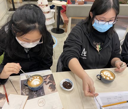 Students are trying latte art.