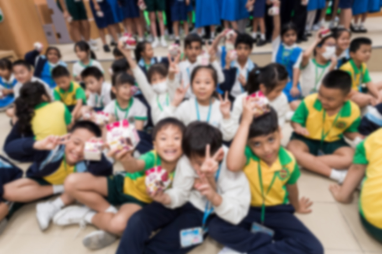 Sharing fresh CityU Milk with primary students