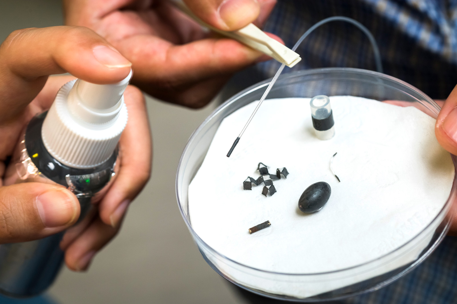 A magnetic force can move an object around different surfaces after it has been sprayed with the M-spray.