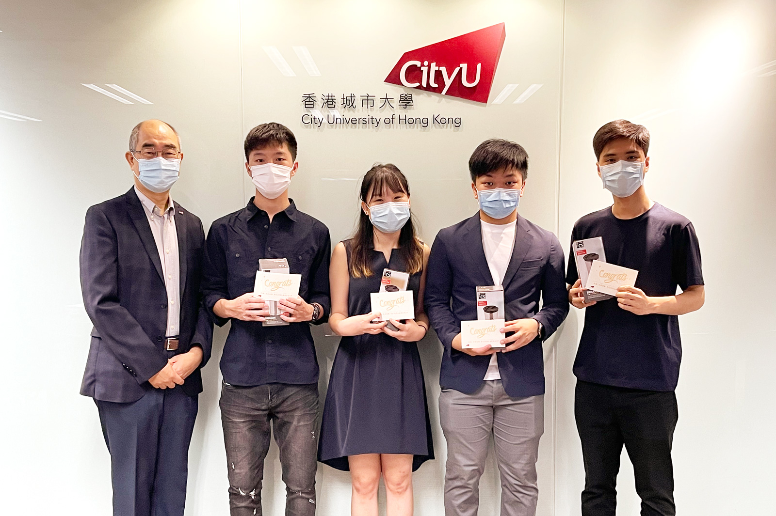 (From left) Professor Raymond Chan, Andy Wong, Monica Chan, Harvey Ng and Xavier Yeung.