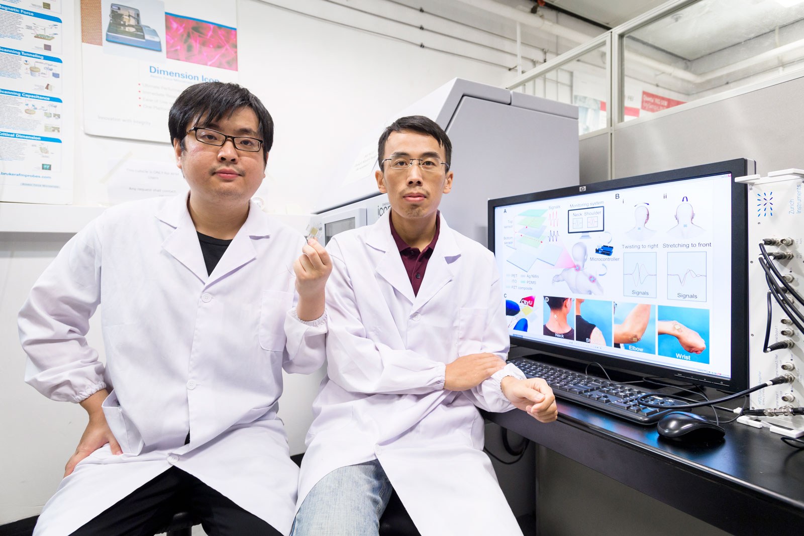 (From right) Dr Yang Zhengbao and Hong Ying, members of the research team.