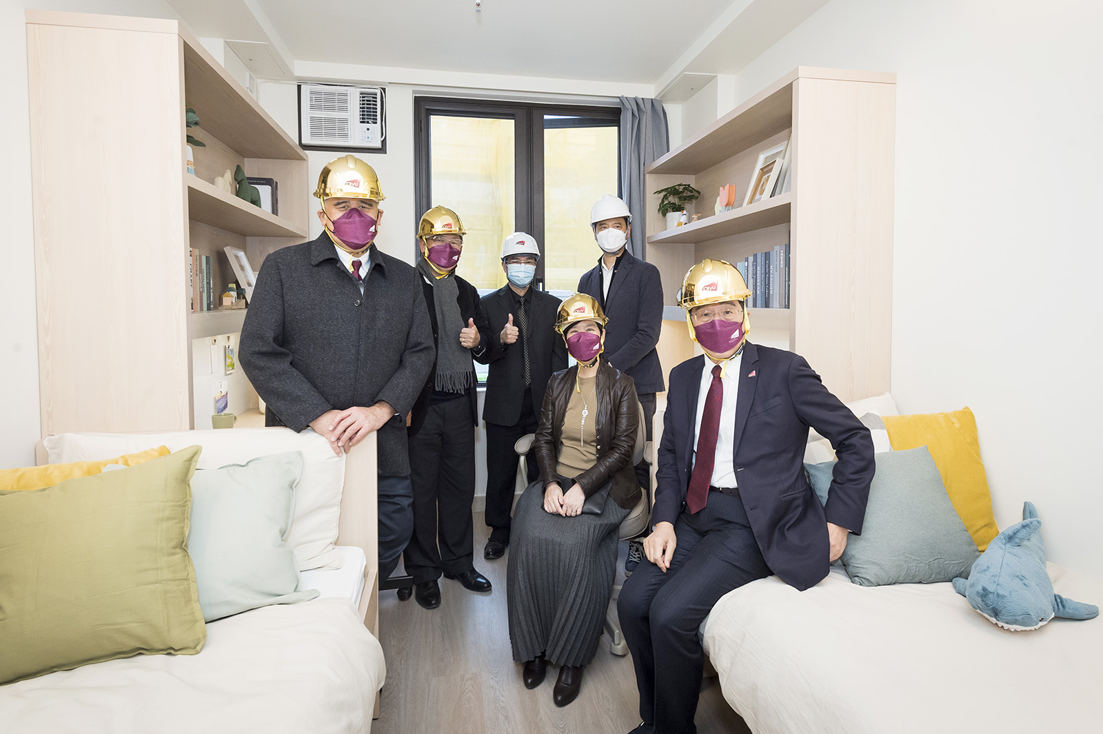 Guests visit the MiC unit for the new student hostel.