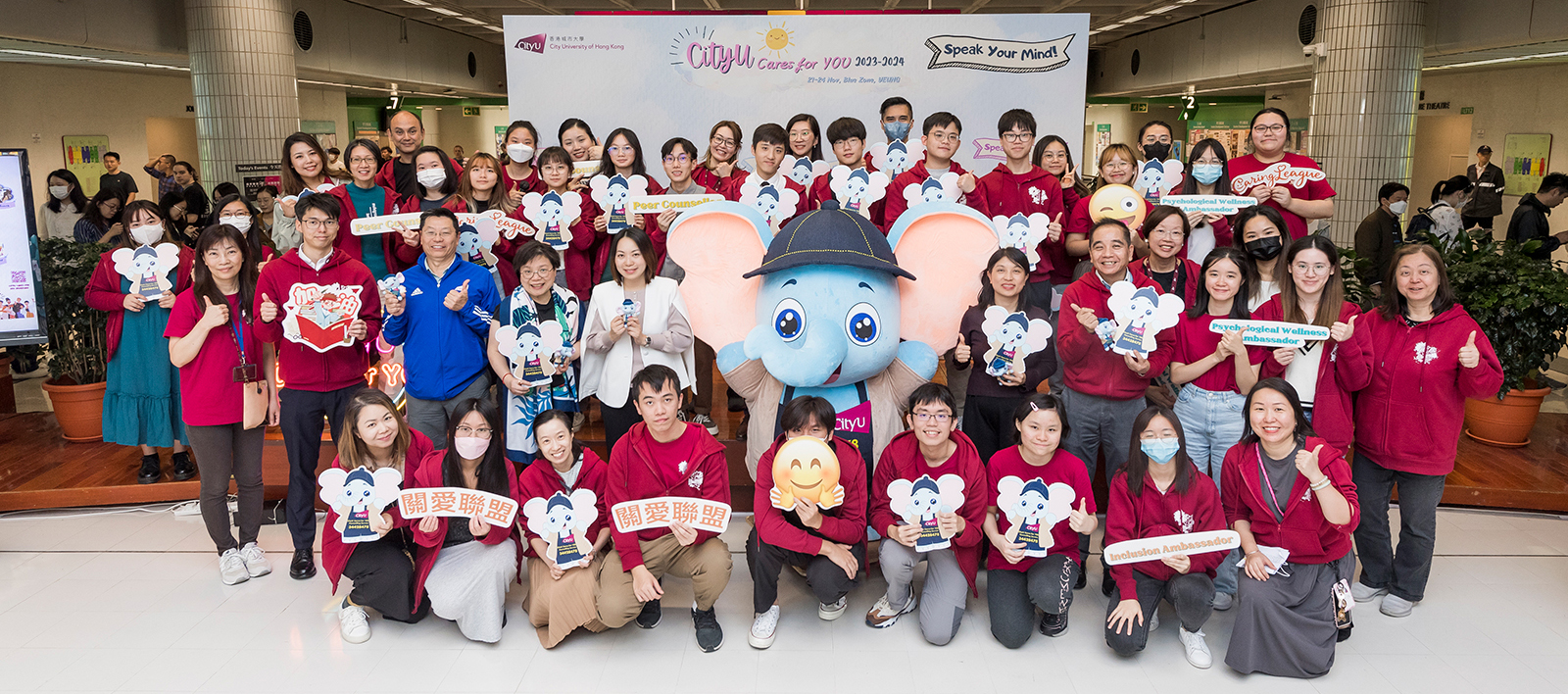 Officiating guests and caring leaders spread cheer to students with mascot Able at the opening ceremony.