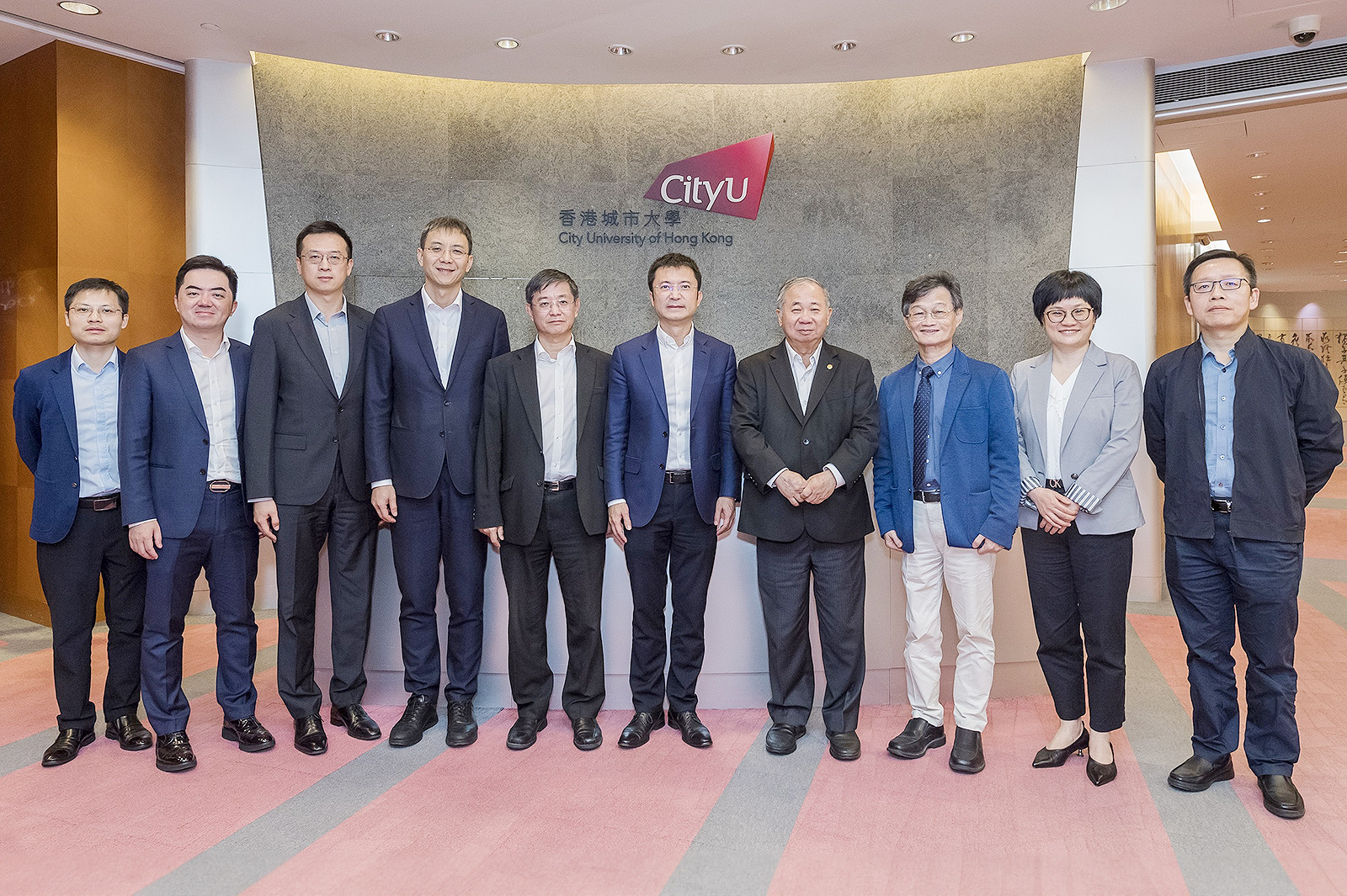 Welcoming the delegation led by Secretary Huang (fifth from right) are President Freddy Boey (fourth from right), Professor Chen Fu-rong (third from right), Professor Wang Jianping (second from right), Associate Provost (Quality Assurance and Accountability), Professor Lu Jian (fifth from left), Dean of the College of Engineering, and Mr Tony Chen (first from right), Deputy Director of Research Institutes in the Mainland.