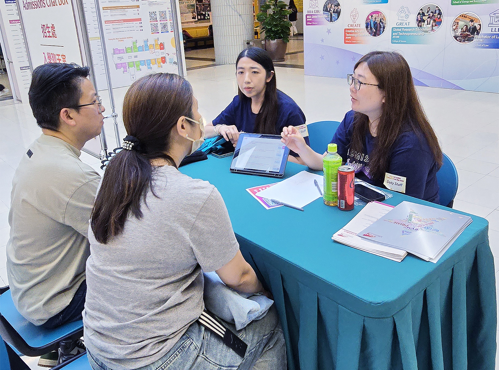 Parents and students prepare for JUPAS reprioritisation through one-on-one consultation sessions.