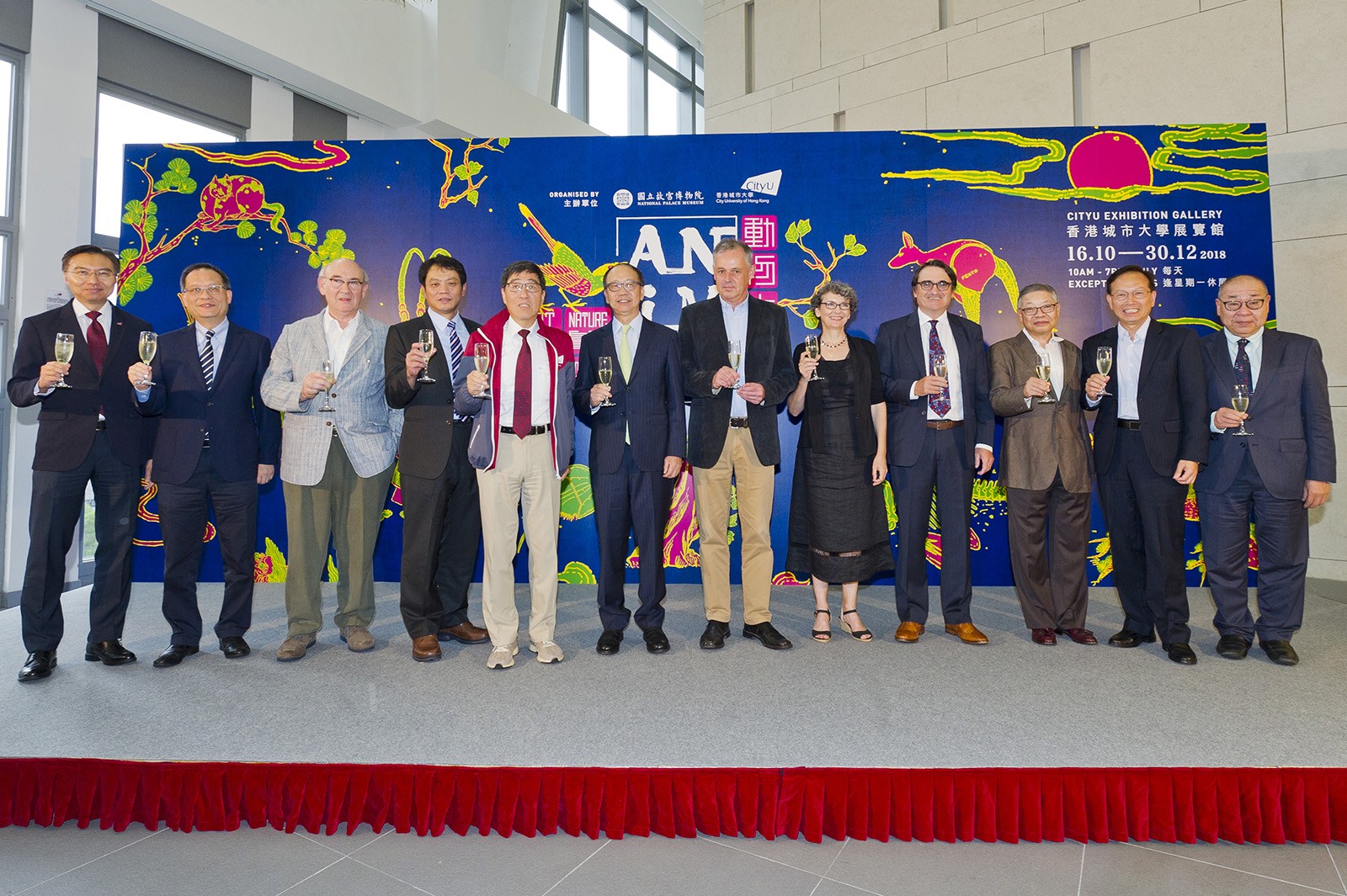 Guests toast at the opening ceremony.