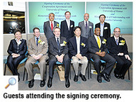111130-3_signing.jpg Thumbnail